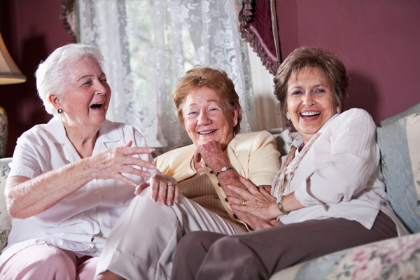 Three senior women enjoying a moment together