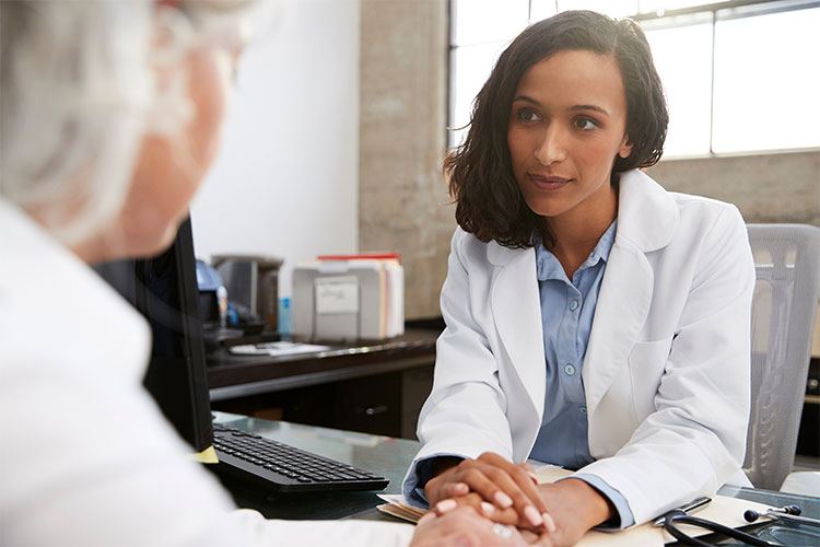 Healthcare professional engaged with a resident