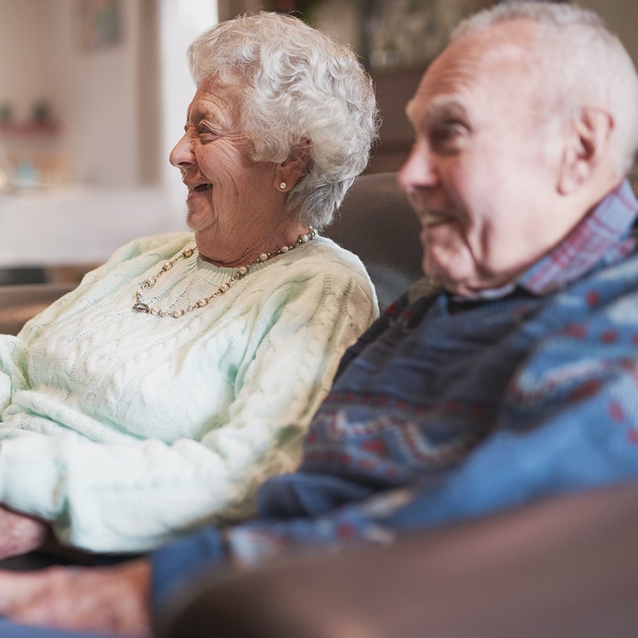 Senior couple enjoying time together in a common area