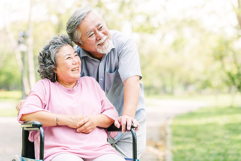 Senior couple enjoying time outdoors in the park.