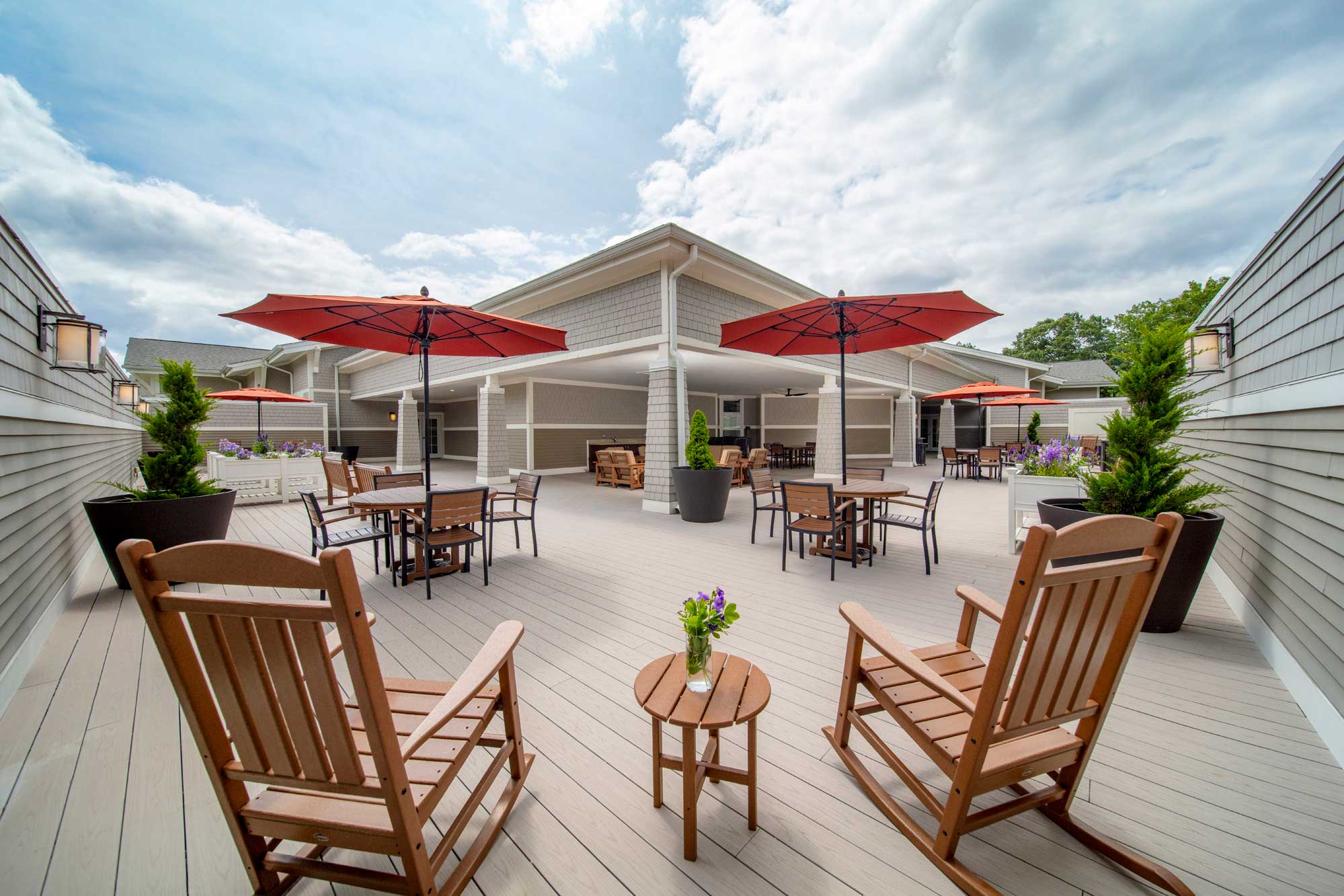 Outdoor patio area with seating and umbrellas