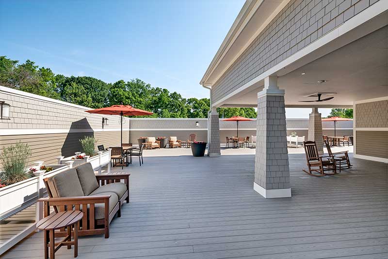 Outdoor patio with seating areas at the facility