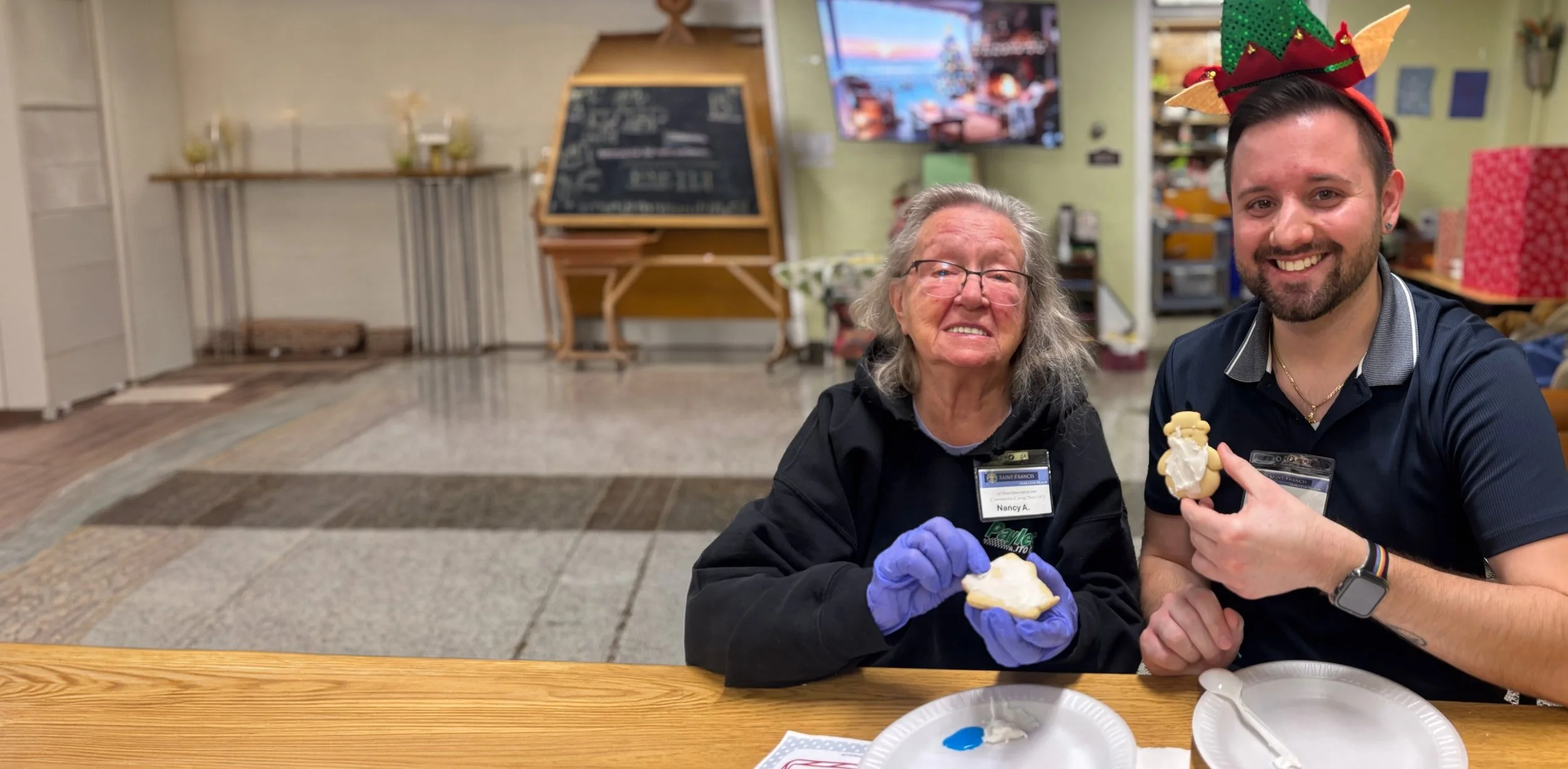 Residents enjoying treats and celebrating together