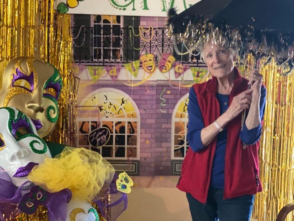Resident enjoying a festive celebration with decorations