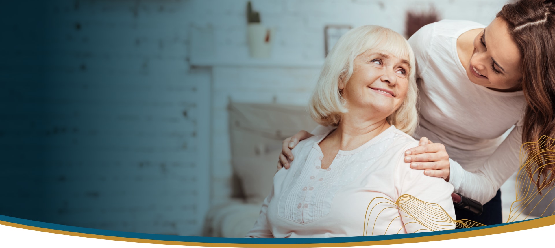 Caregiver interacting with a senior resident indoors.