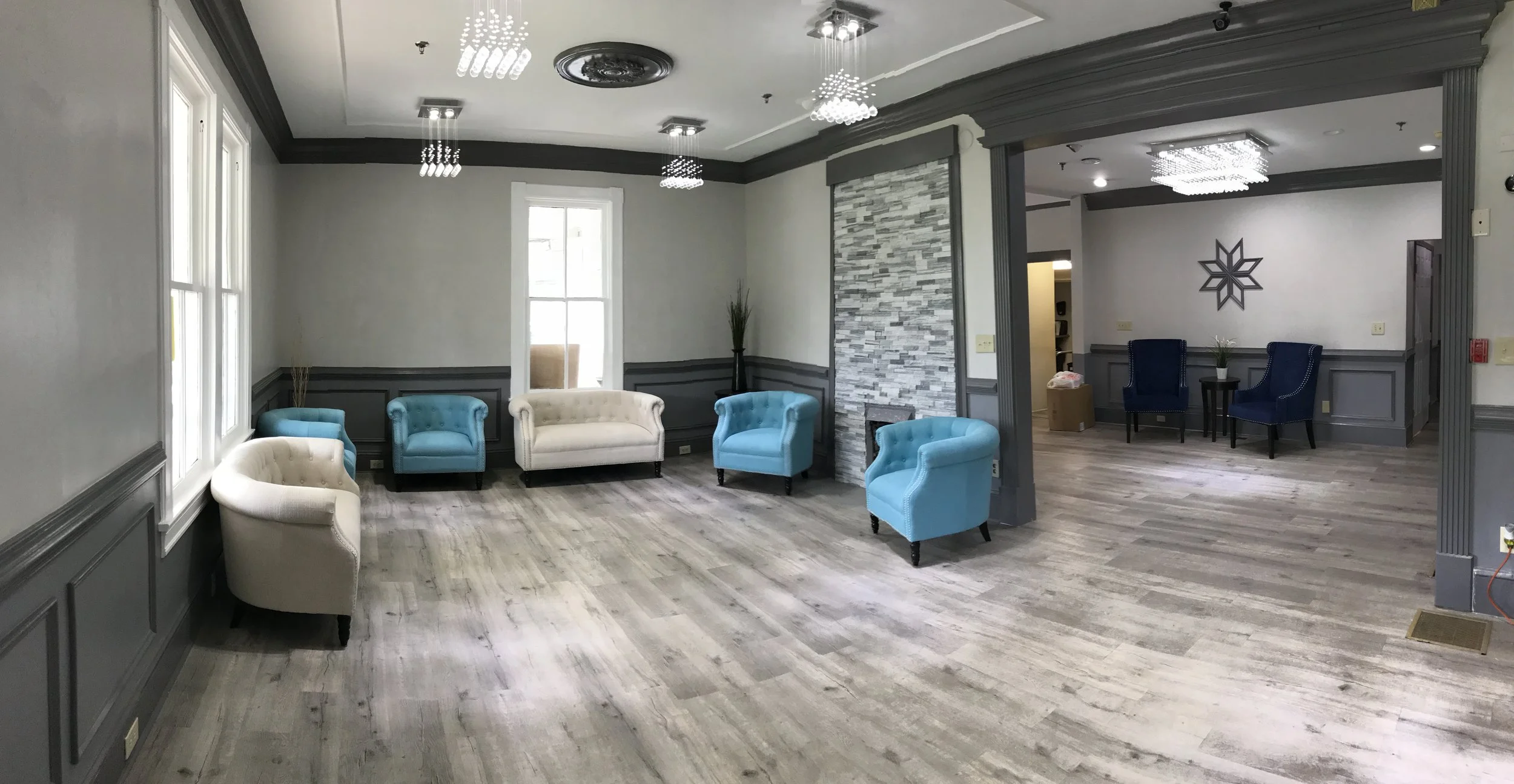 Common area with modern furnishings and natural light