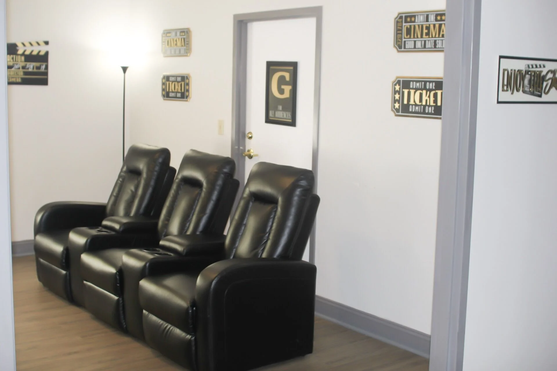 Cozy cinema-style seating in a common area