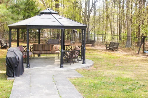 Outdoor gazebo area with seating