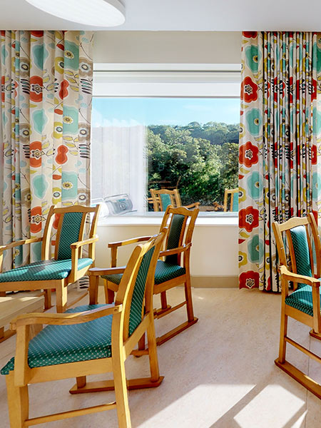 Bright interior with colorful curtains and chairs