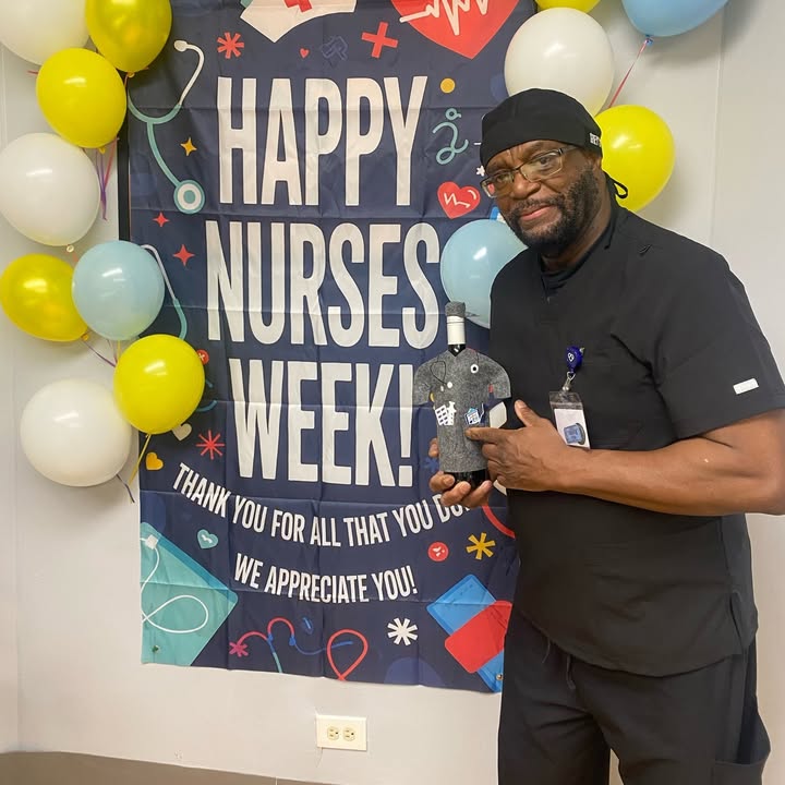 Staff member celebrating Nurses Week with awards