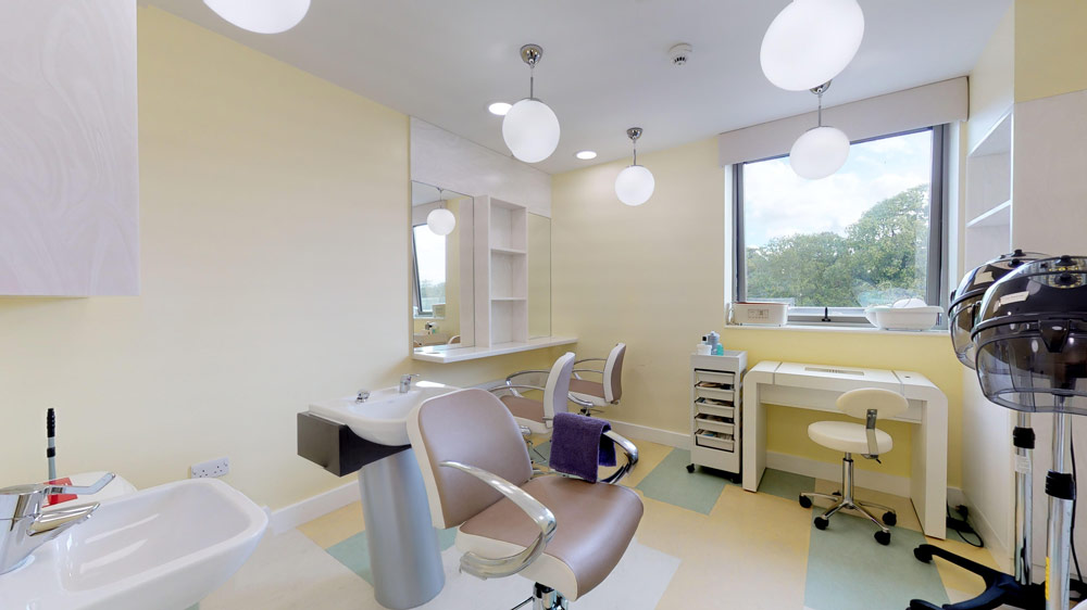 Bright hair salon with modern styling stations