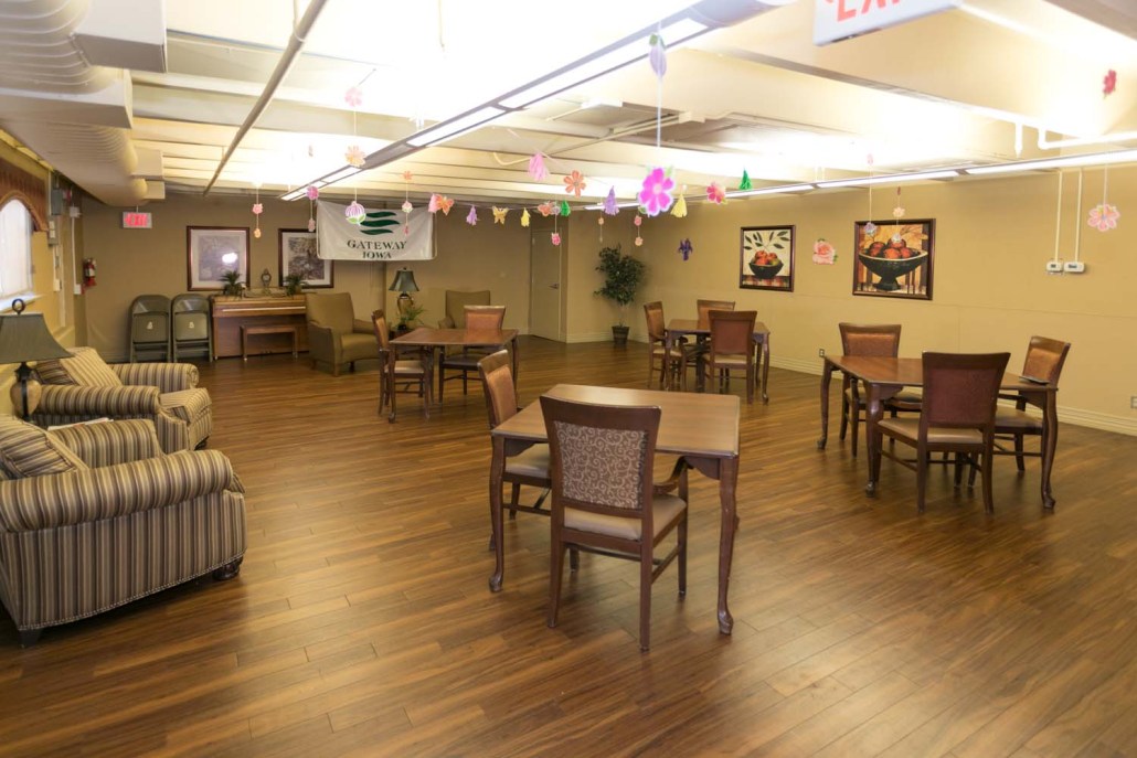 Common room with tables and chairs for activities