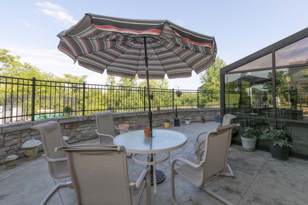 Outdoor seating area with a patio umbrella