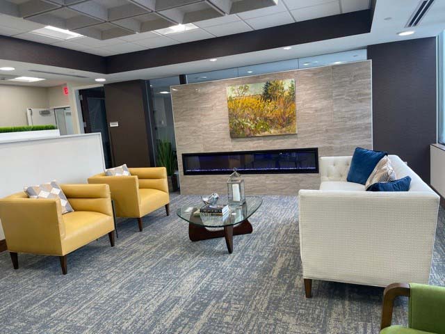 Cozy common area with seating and artwork