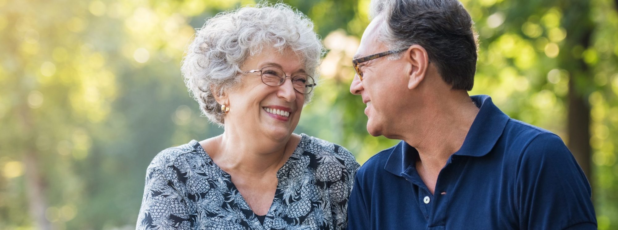 A joyful senior couple enjoying time outdoors.