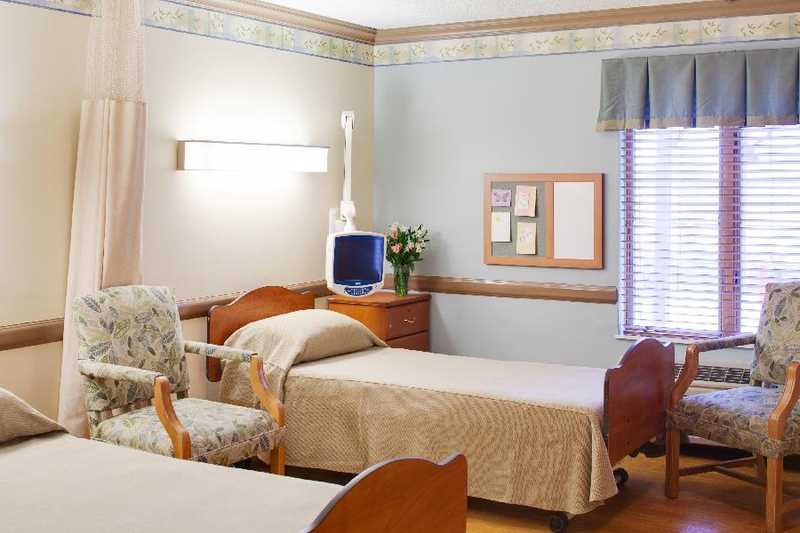 Interior view of a resident room with two beds