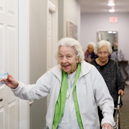 Residents engaged in a hallway activity