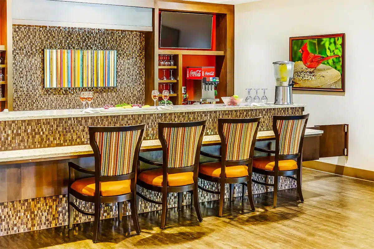 Interior view of a stylish bar area with seating