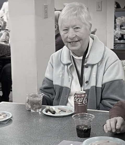 Resident enjoying snacks at a dining area