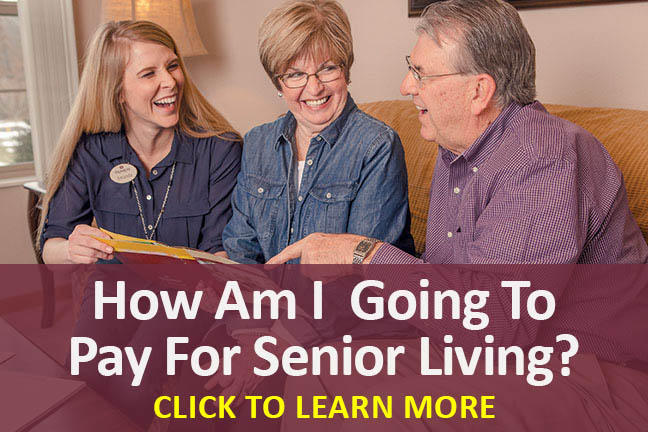 Residents discussing senior living options with staff