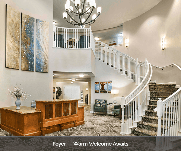 Bright foyer area with comfortable seating and decor