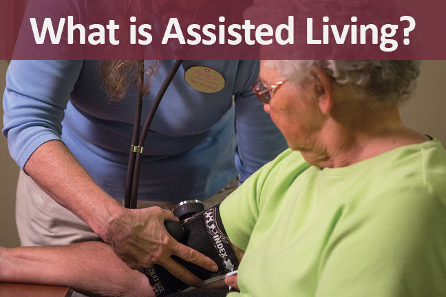 Staff assisting a resident with health monitoring