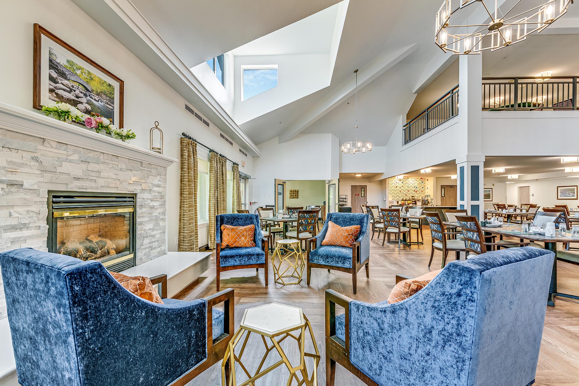 Interior common area with seating and dining in the background