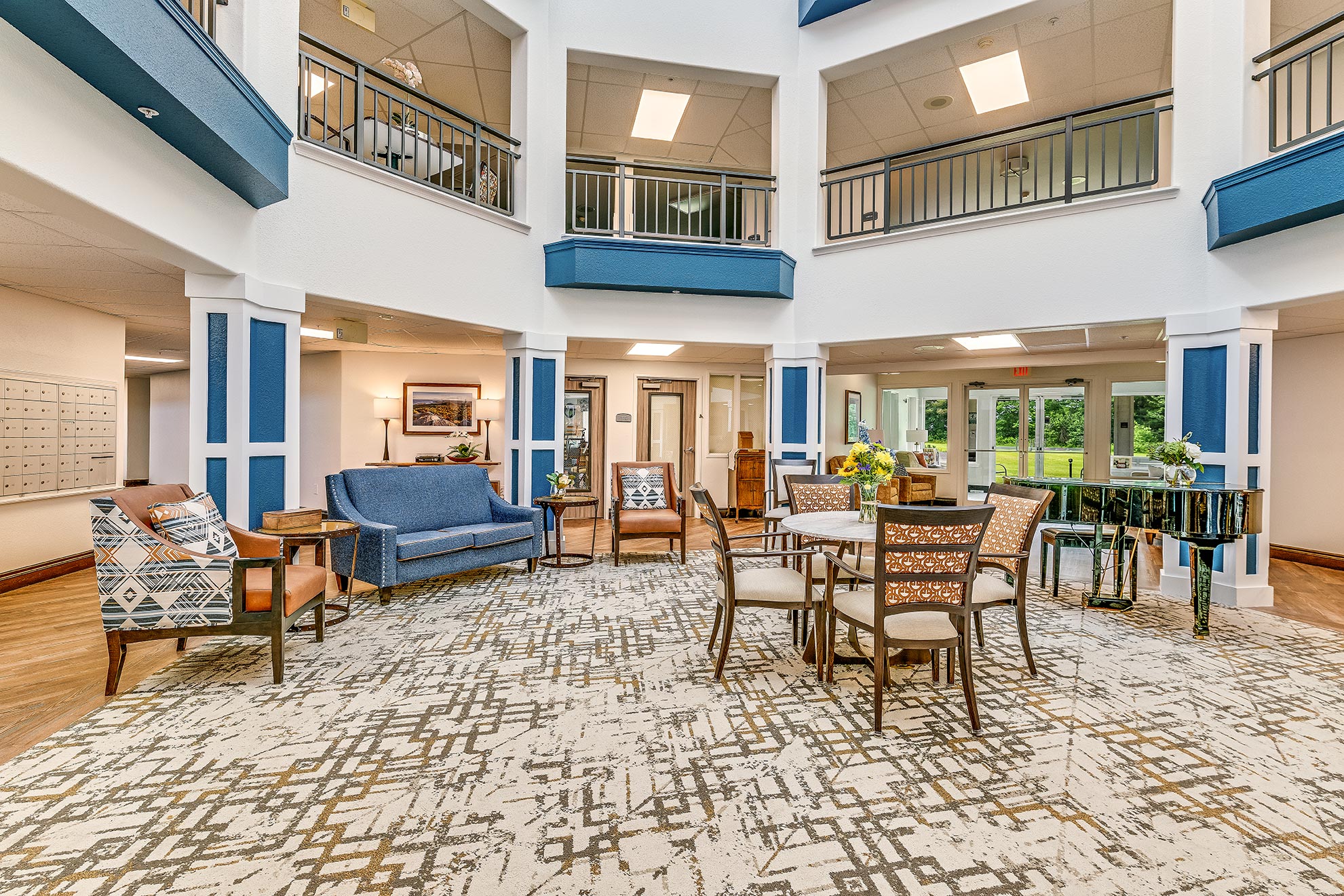 Bright common area with seating and decorations
