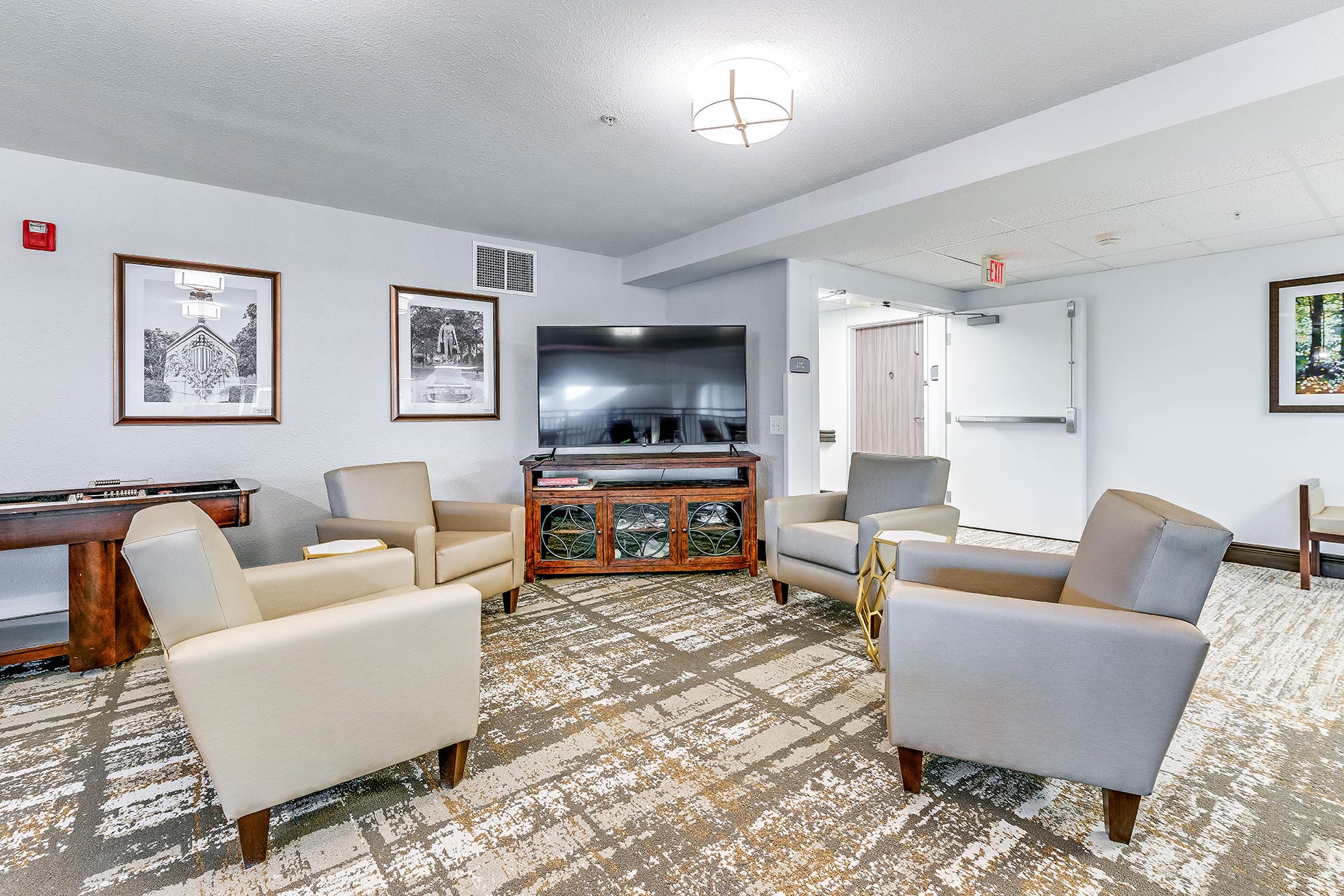 Interior common area with seating and television