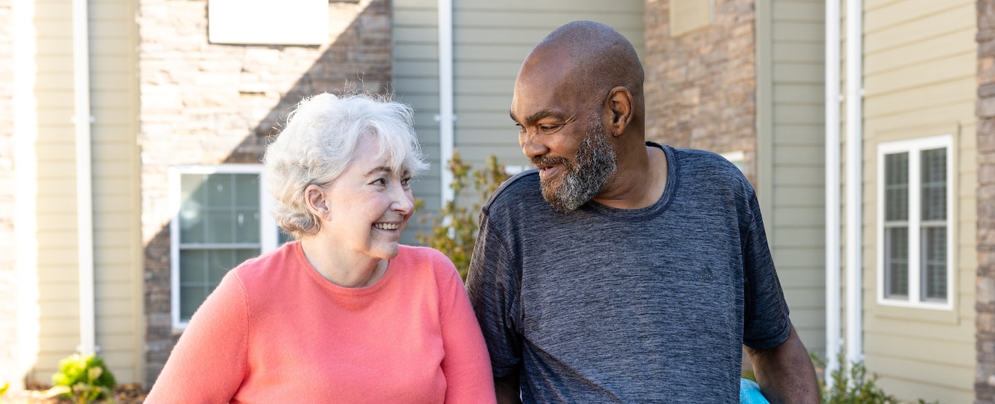Two residents enjoying a moment outside