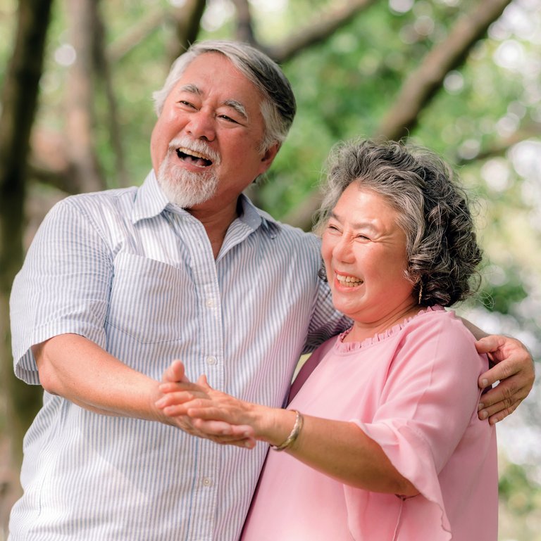 Happy seniors enjoying time outdoors together