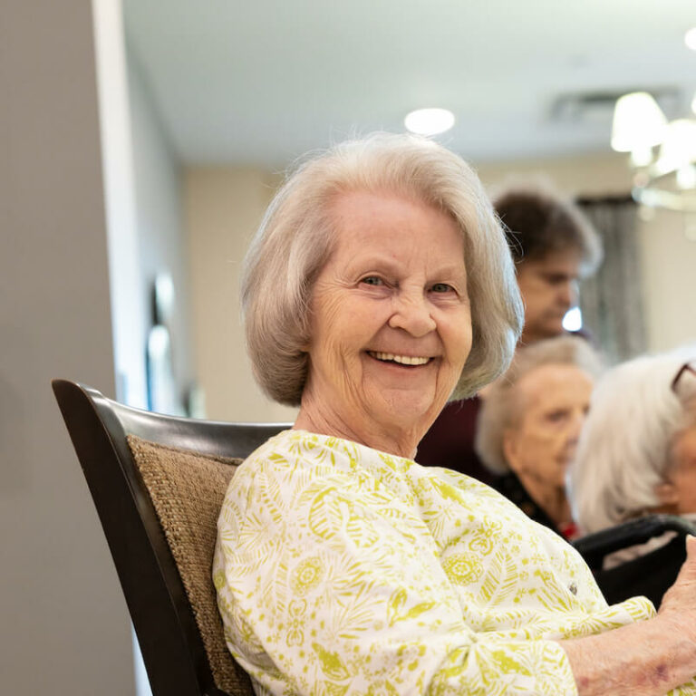 Smiling senior resident enjoying an activity