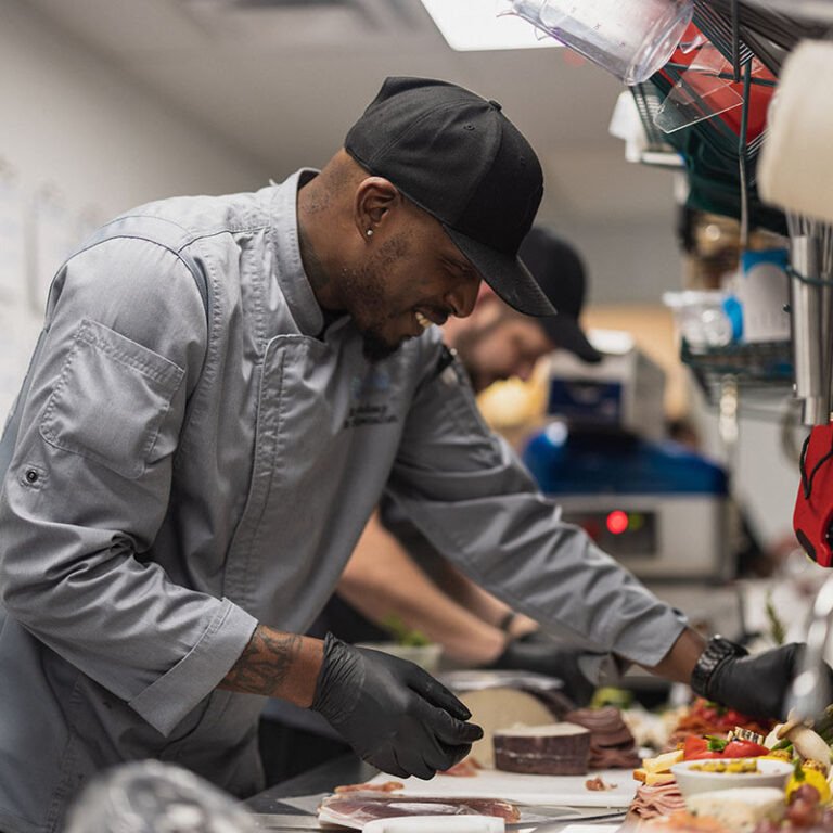 Chef preparing food in a kitchen