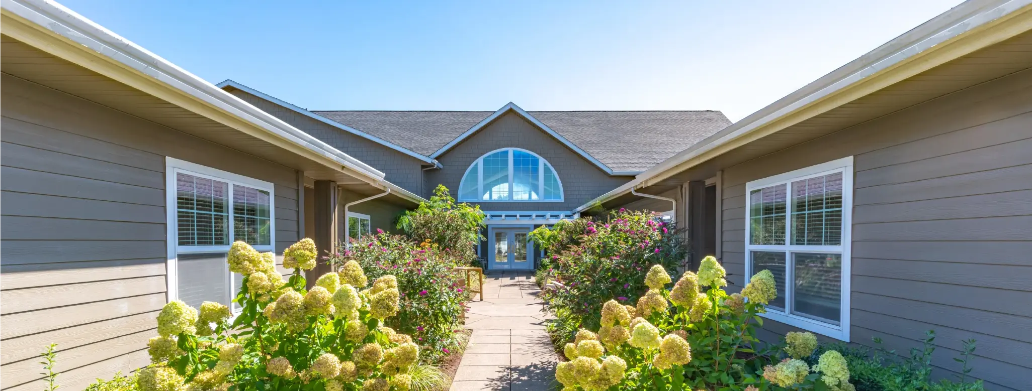 Pathway leading to the main entrance of Evergreen Senior Living