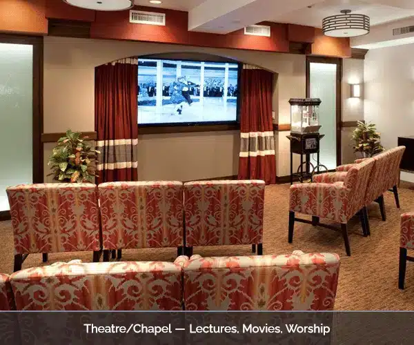 Interior of a cozy theater/church area with seating