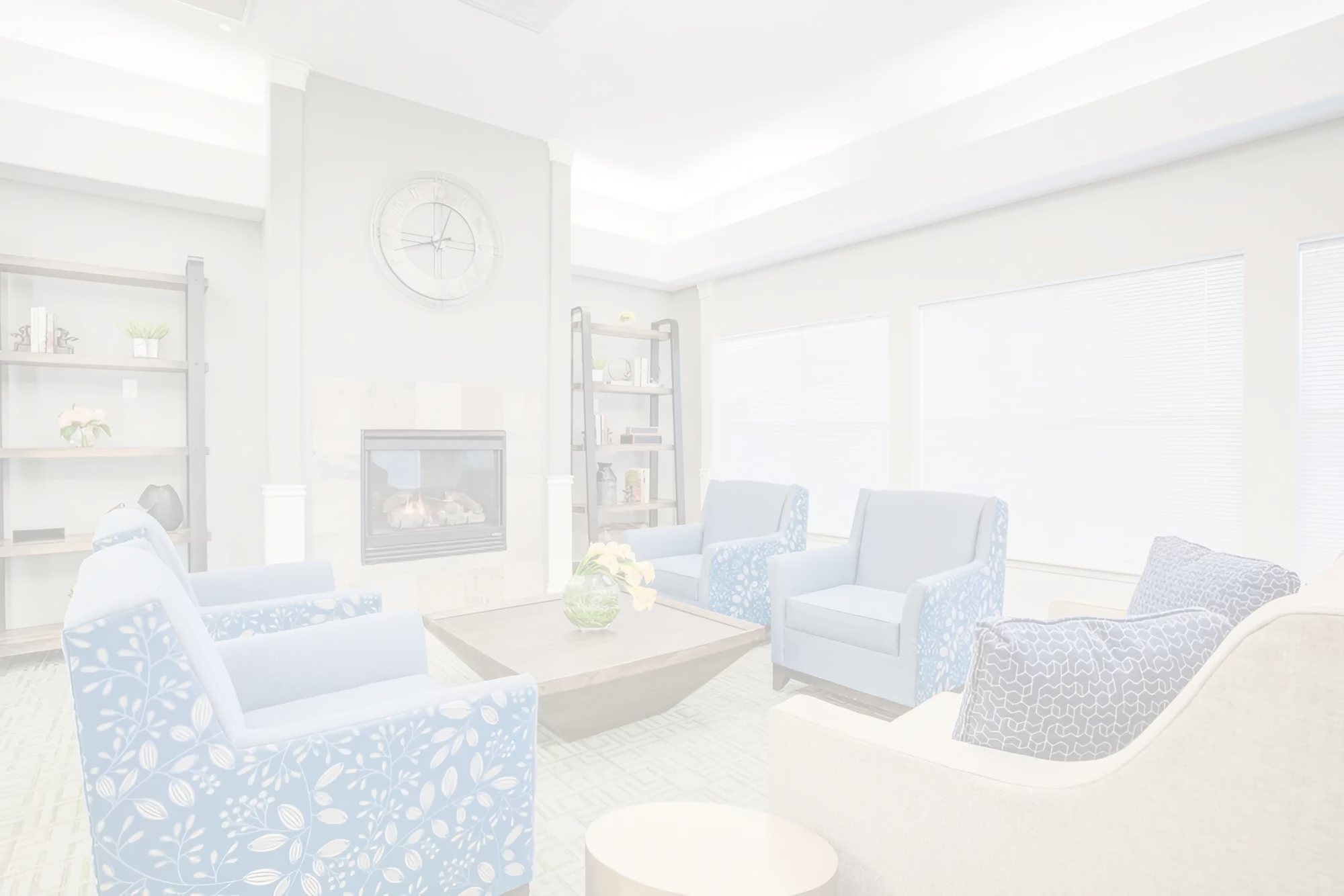 Cozy common area with seating and a fireplace