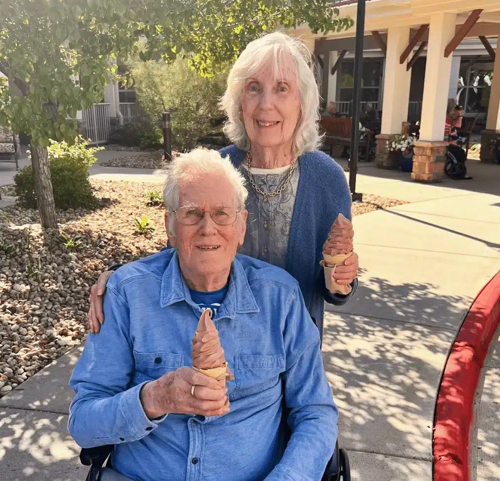 Two residents enjoying ice cream in the garden