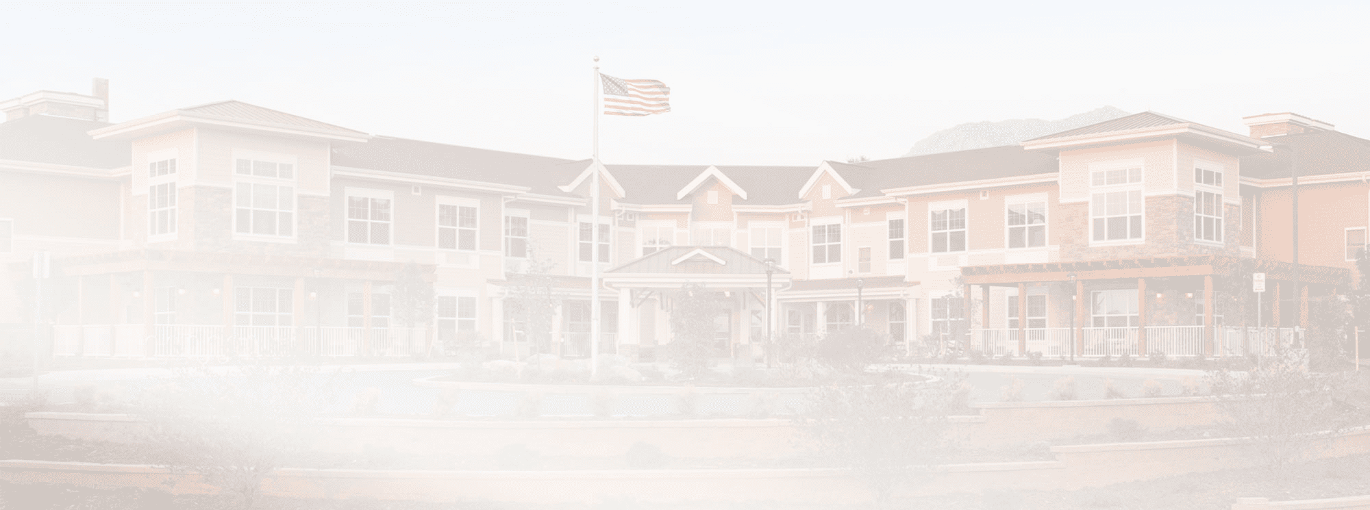 Blurred image of a senior living facility exterior