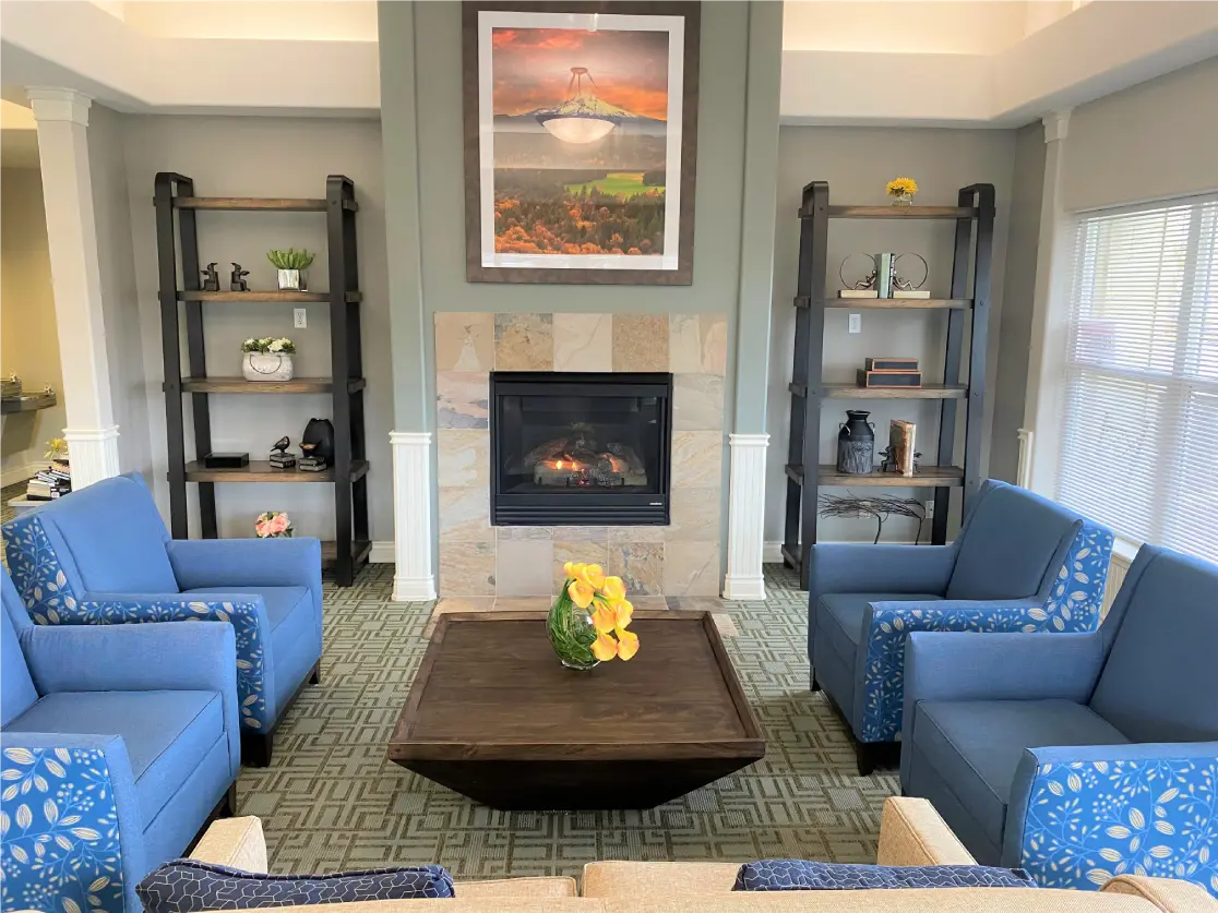 Cozy common area with a fireplace and seating