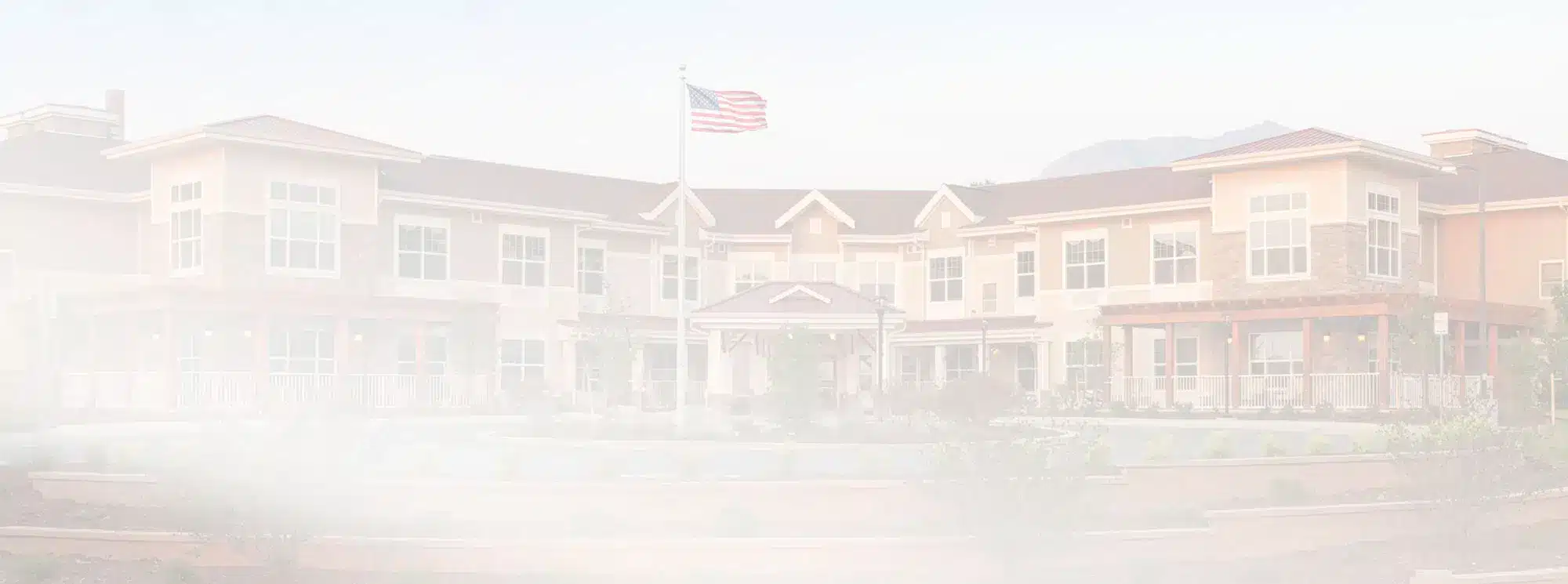 Exterior view of MorningStar Senior Living with American flag