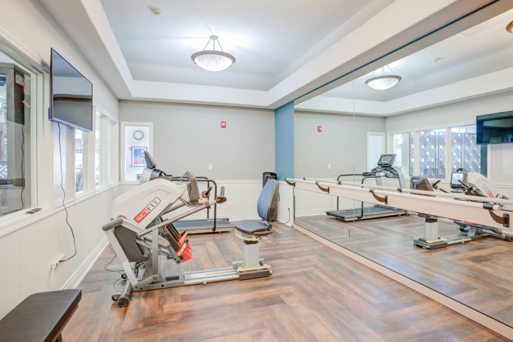 Interior view of a fitness room with exercise equipment