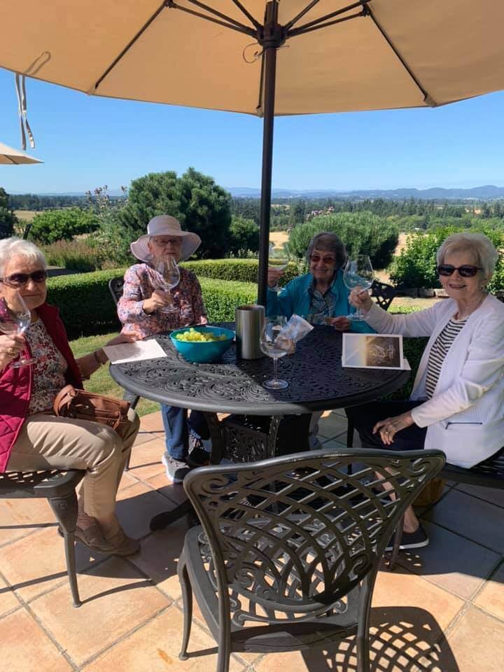 Residents enjoying a sunny gathering outdoors