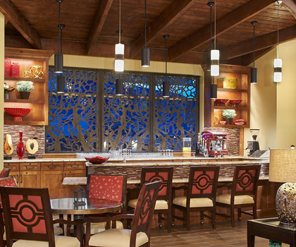 Cozy common area with a bar and decorative lighting