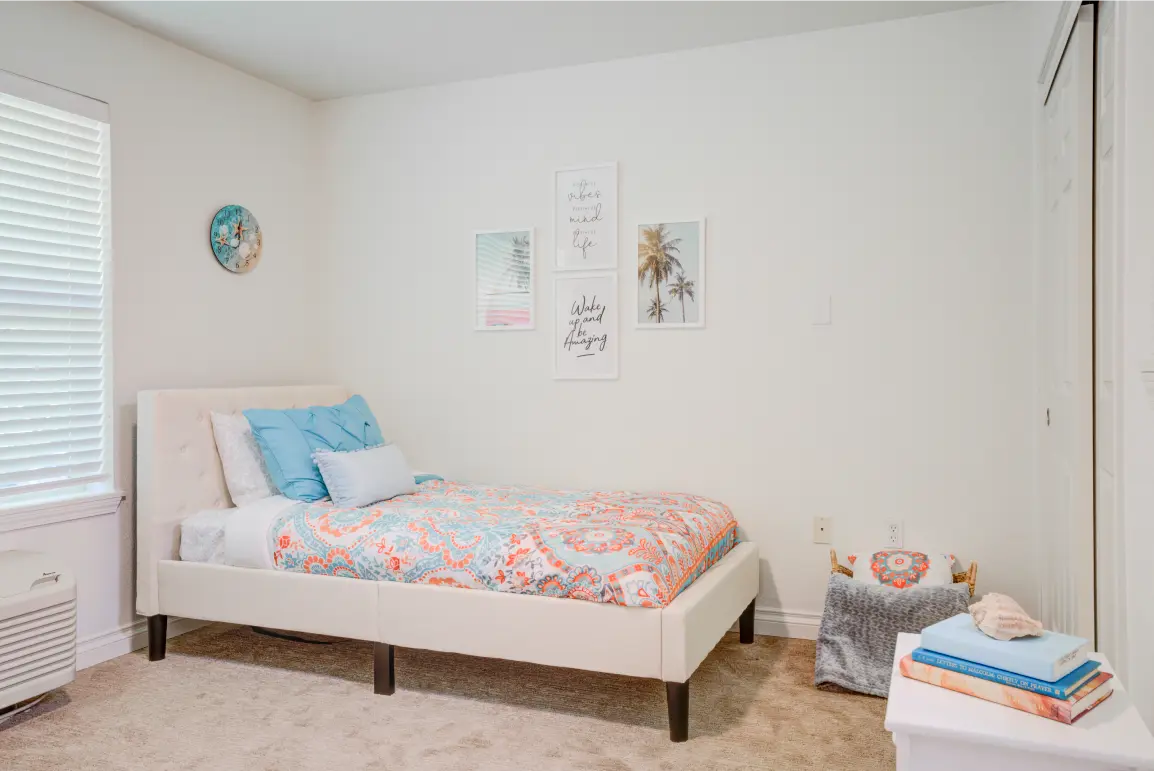 Cozy resident room with colorful bedding and decor