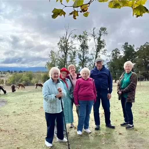 Residents enjoying time outdoors in a garden area