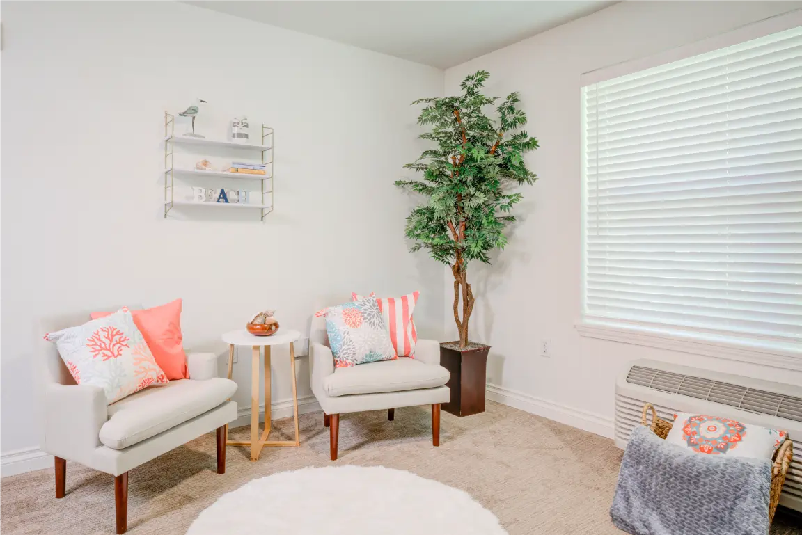 Cozy common area with chairs and decor
