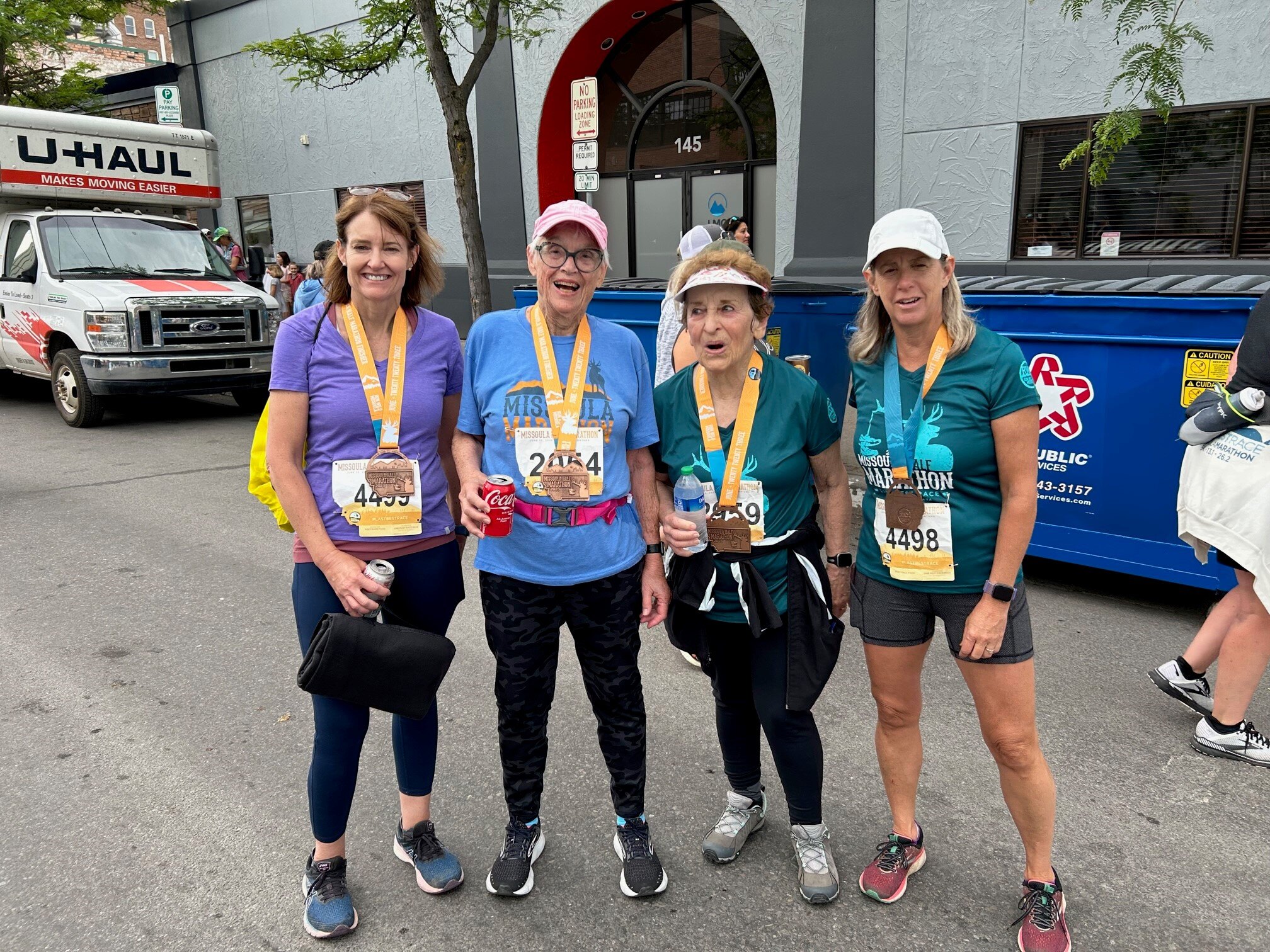 Participants celebrating after a marathon event