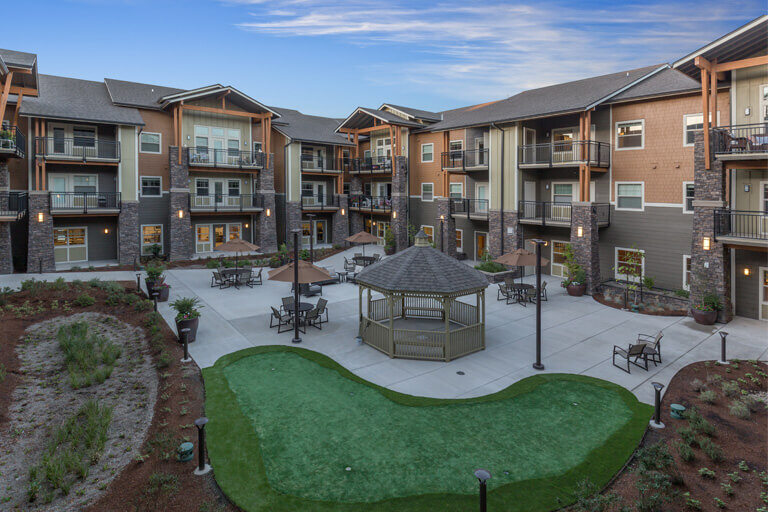 Outdoor courtyard with seating and gazebo