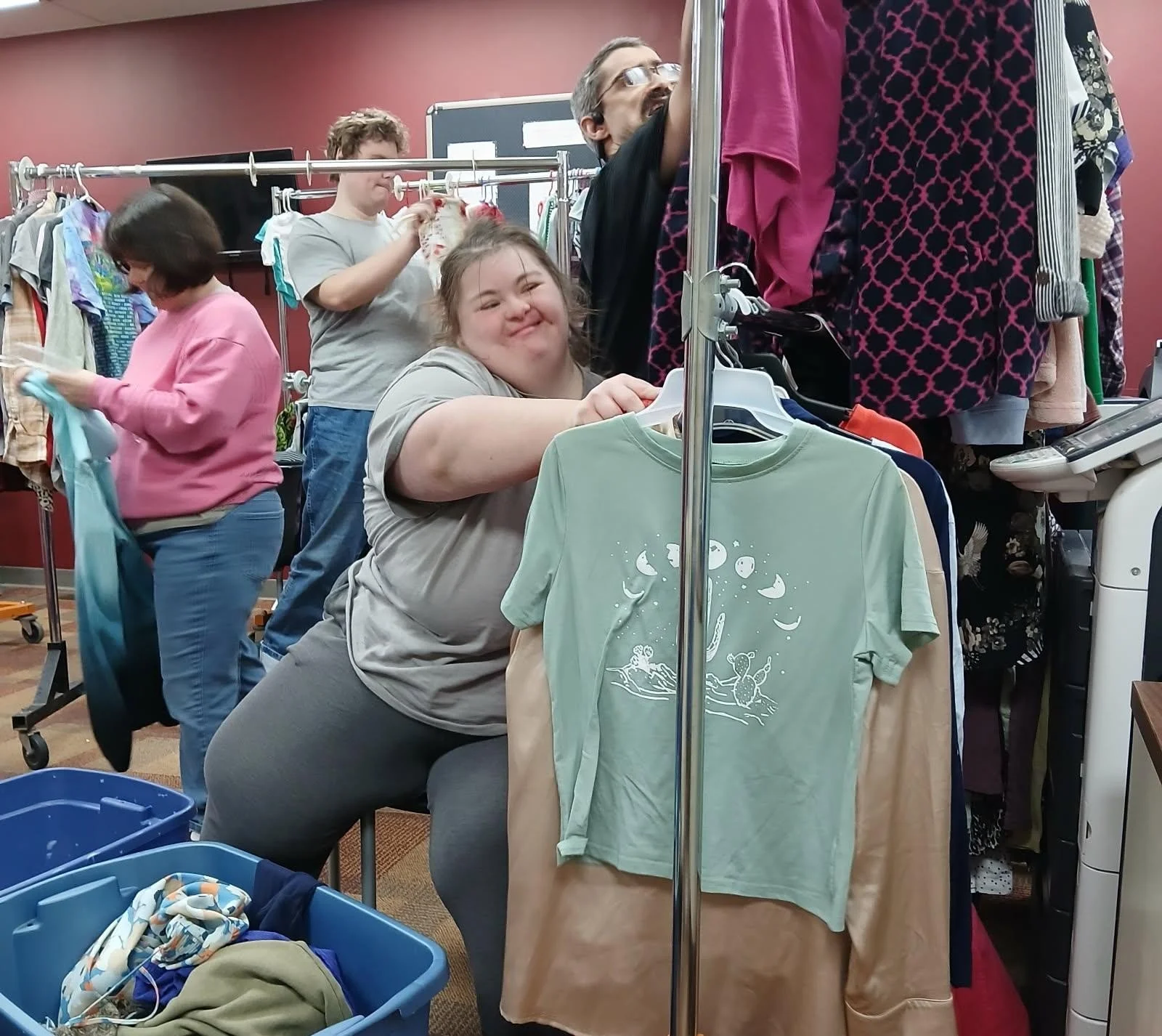 Residents engaged in a clothing donation activity.