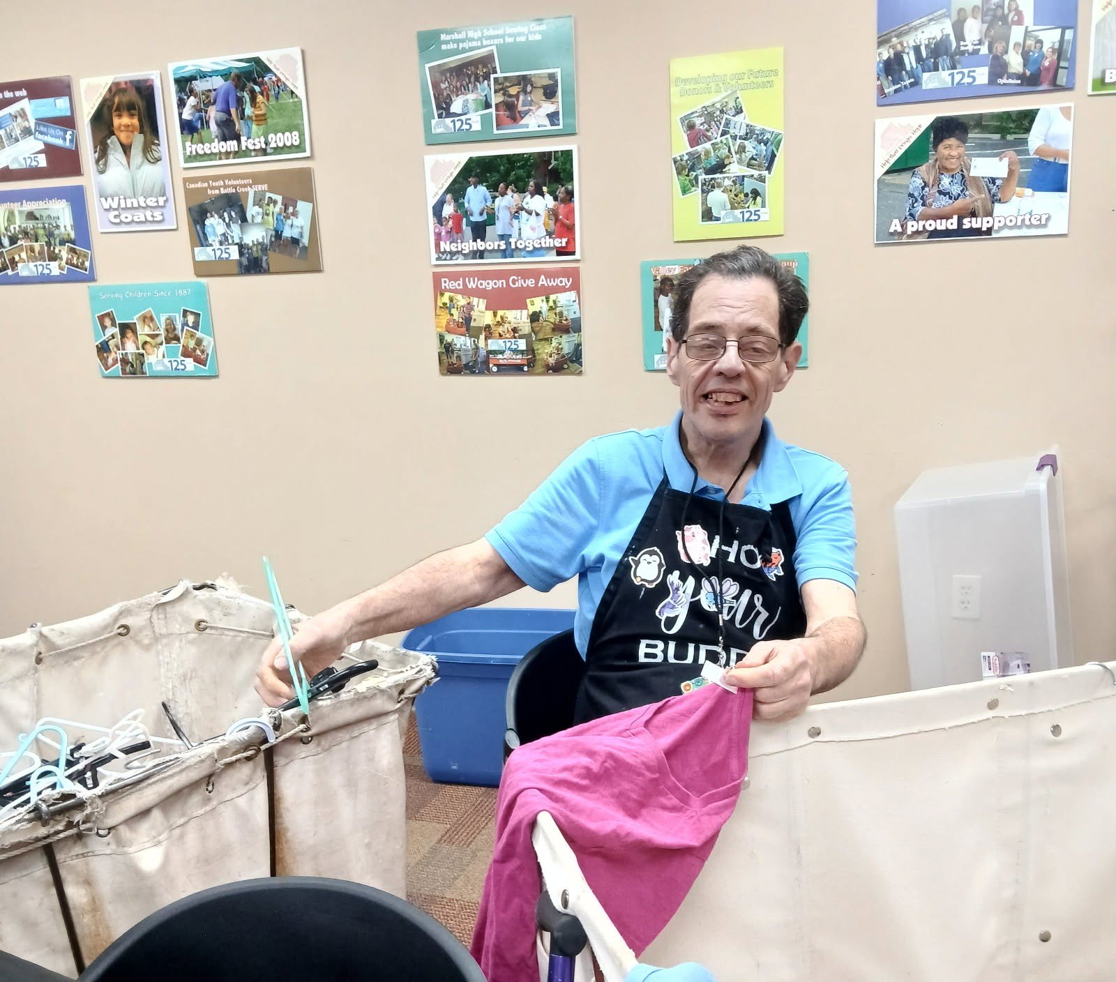 Resident engaging in an activity with fabric